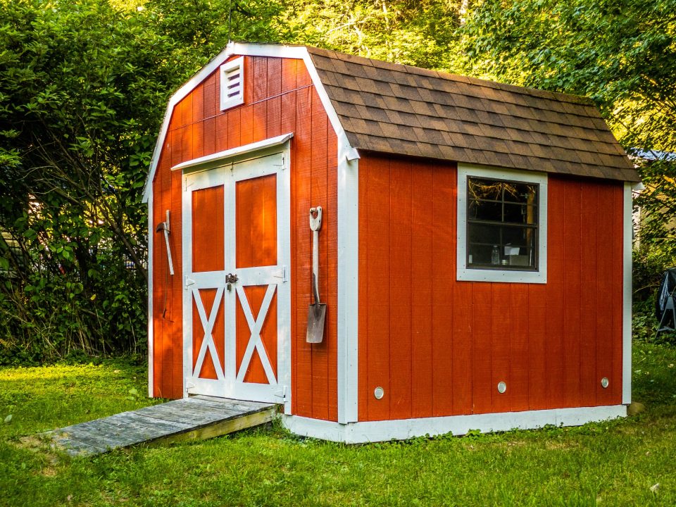 red storage barn with gambrel roof
