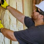Professional insulating a storage shed